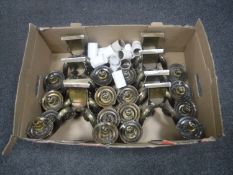 A box containing eight brass two-way wall lights