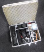 An aluminium case containing Pentax E Super camera together with a Praktica Super TL camera,