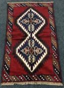 A Baluchi rug 135 cm x 79 cm