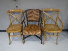 A square painted pine kitchen table together with a bentwood armchair,