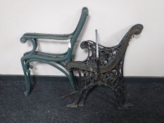 A pair of Victorian cast iron bench ends together with another