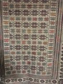 A needlework Sumak kilim rug,