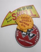 Three cast iron signs; Shell Motor Oil,