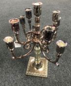 A silver plated nine-way table candelabrum