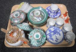 A tray of oriental wares including blue and white coffee cans and saucers, miniature Japanese vases,