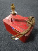 A vintage petrol can converted to an oil lamp