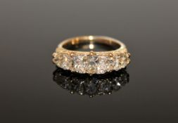 A five-stone old cut diamond ring, the total diamond weight estimated at 1.