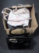 A box and luggage case containing a quantity of assorted lady's hand bags