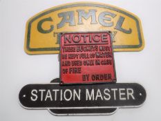 Three cast iron signs; Camel Trophy,