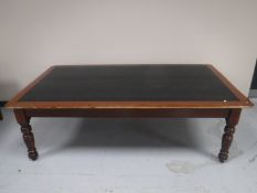 A Victorian library table fitted two drawers CONDITION REPORT: 215cm long,