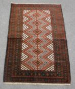 An old baluchi rug 128 cm x 88 cm