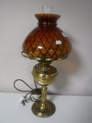 A brass Duplex oil lamp with glass chimney and shade,