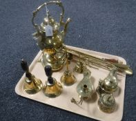 A tray containing assorted brass ware including spirit kettle on stand, oil lamp, hand bells,