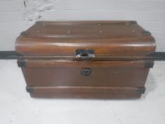 An early 20th century tin trunk