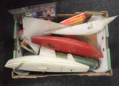 A box containing pond yachts, boxed Keil Craft dolphin glider,