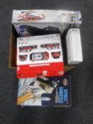 A box of assorted plastic modelling kits