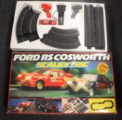 A boxed Ford RS Cosworth Scalextric set