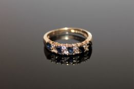 A 9ct gold sapphire and diamond ring, size K, approximately 0.2ct.