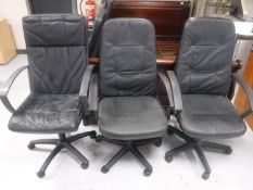 Three swivel adjustable executive office armchairs