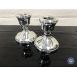 A pair of silver squat candlesticks, height 6.