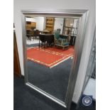 A contemporary silvered framed overmantel mirror