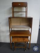 A 20th century teak side table, teak storage shelves,