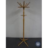 A pine hat and coat stand