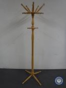 A pine hat and coat stand