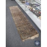 An Axminster carpet runner CONDITION REPORT: 280cm by 68cm.