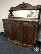 A Victorian mahogany serpentine fronted mirror backed chiffonier