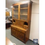 A late Victorian walnut secretaire cabinet,