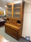 A late Victorian walnut secretaire cabinet,