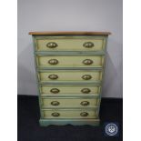 A pine painted six drawer chest with brass handles