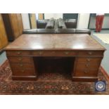 A good quality Georgian style pedestal desk with Burgundy leather top ,
