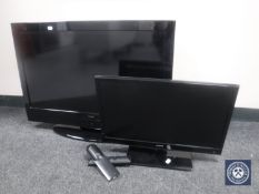 A Technika 32" LCD TV with remote and a Polaroid 22 inch LCD TV with remote