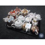 Eleven assorted teapots including Victoria & Albert Museum, Sadler,