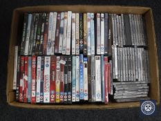 A box of DVD's and CD's