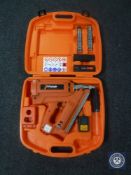 A cased Peslode Impulse Im-350/90 CT nail gun