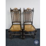 A pair of oak barley twist chairs