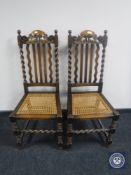A pair of oak barley twist chairs