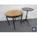 A circular French style occasional table and a leather topped wine table