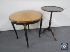 A circular French style occasional table and a leather topped wine table