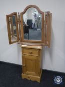 A pine bedside cabinet and a pine triple dressing mirror