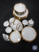 Forty-two pieces of Noritake Legacy Gold tea and dinner ware