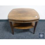 A rosewood two tier occasional table