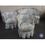 An antique three piece shaped back suite