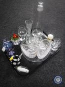 A tray of glass ware, three glass paper weights,