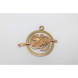 An 18ct gold French artillery pendant
