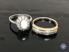 A 9ct gold dress ring set with diamonds together with a silver cluster ring.