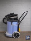 A Numastic industrial wet and dry vac cleaner,